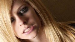 Woman teeth close-up Avril Lavigne faces blondes long hair 