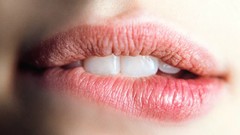 Woman teeth lips biting lips