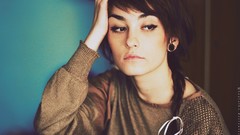 Woman thinking brunettes braids hands on head plaits