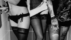 Woman three Headless monochrome legs stockings tattoos lingerie 