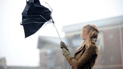 Woman Umbrellas windy