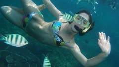 Woman underwater diving bikini