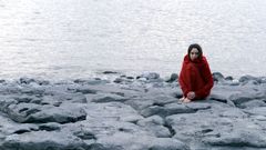 Woman water cold rocks