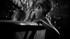 Woman wet monochrome tattoos nude bathtubs