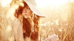 Woman wheat hats faces outdoors models redheads