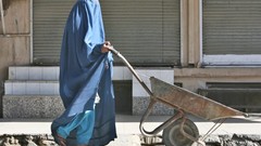 Woman wheelbarrow veils Afghanistan Muslim