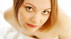 Woman white background brown eyes looking up