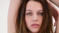 Woman white background faces blue eyes green eyes brunettes 