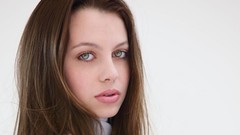 Woman white background faces blue eyes green eyes brunettes 