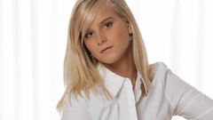 Woman white background faces earrings blondes long hair blue 