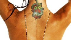 Woman white background tattoos arms raised Audrina Patridge