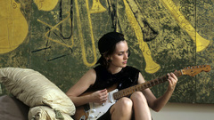 Woman Winona Ryder guitars