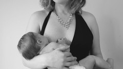 Woman young nude breast feeding