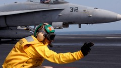 Yellow Aircraft Carrier deck signal sailor jet aircraft 