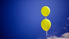 Yellow Balloons blue skies