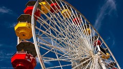 Yellow blue red skyscapes ferris wheels