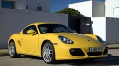 Yellow cars Porsche vehicles porsche cayman front angle view 