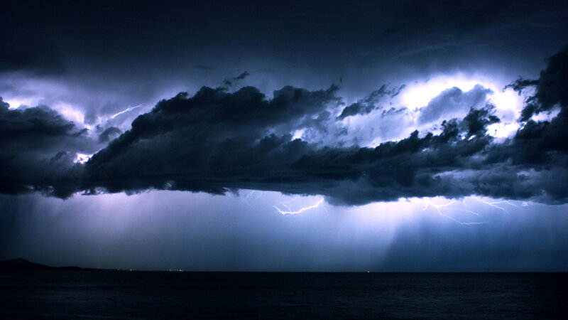 Thunderstorm over Ocean — Dark Blue