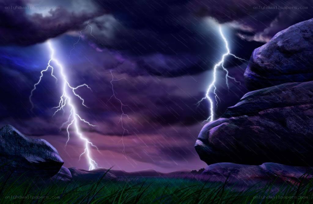 Thunderstorm over rocky landscape