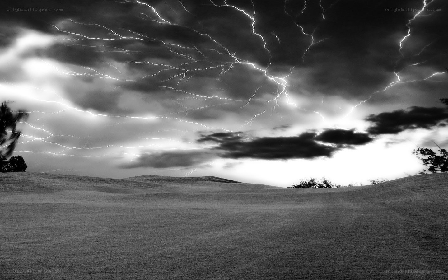 Thunderstorm over rolling hills
