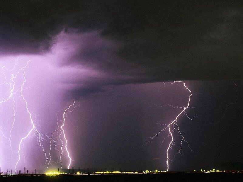 Thunderstorm with lightning strikes