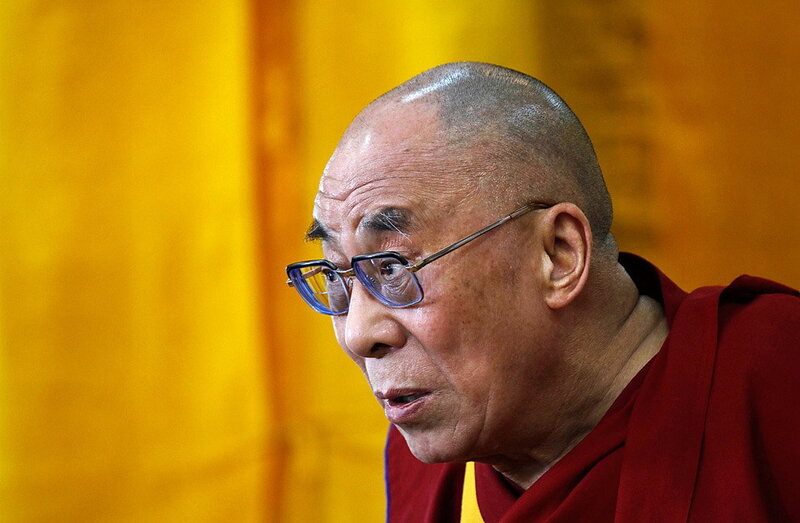 Tibetan Monk Speaking — Red, Serious