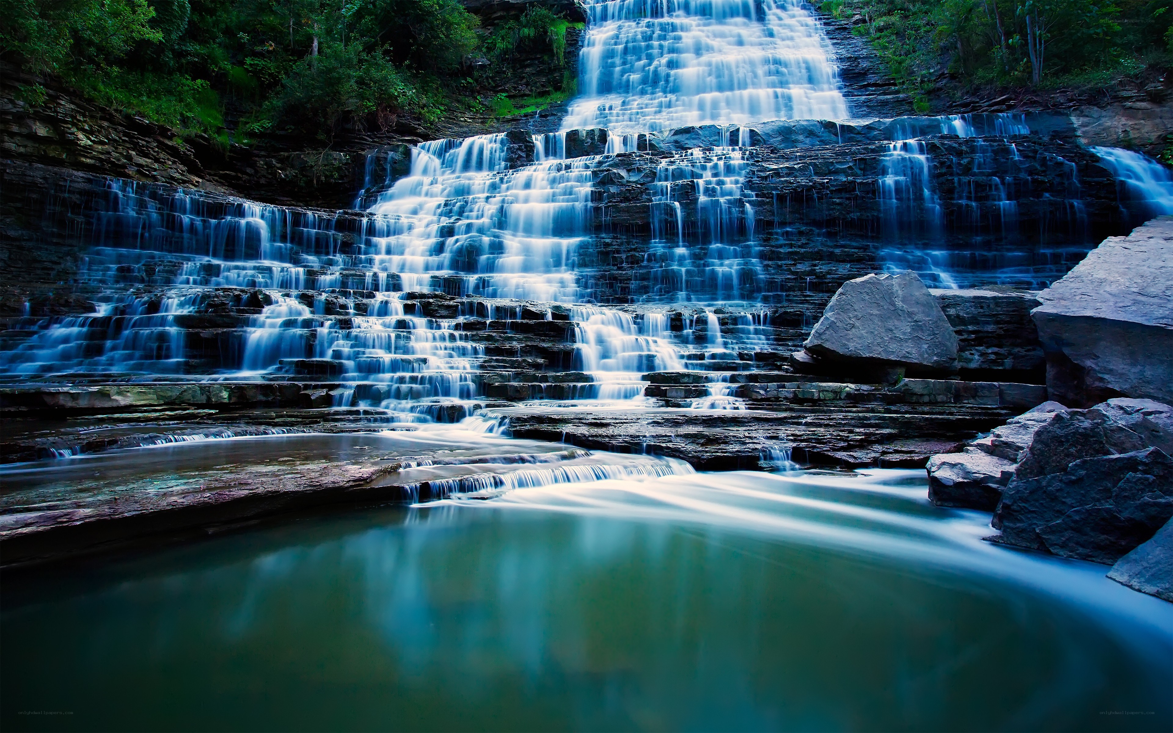 Tiered waterfall in forest