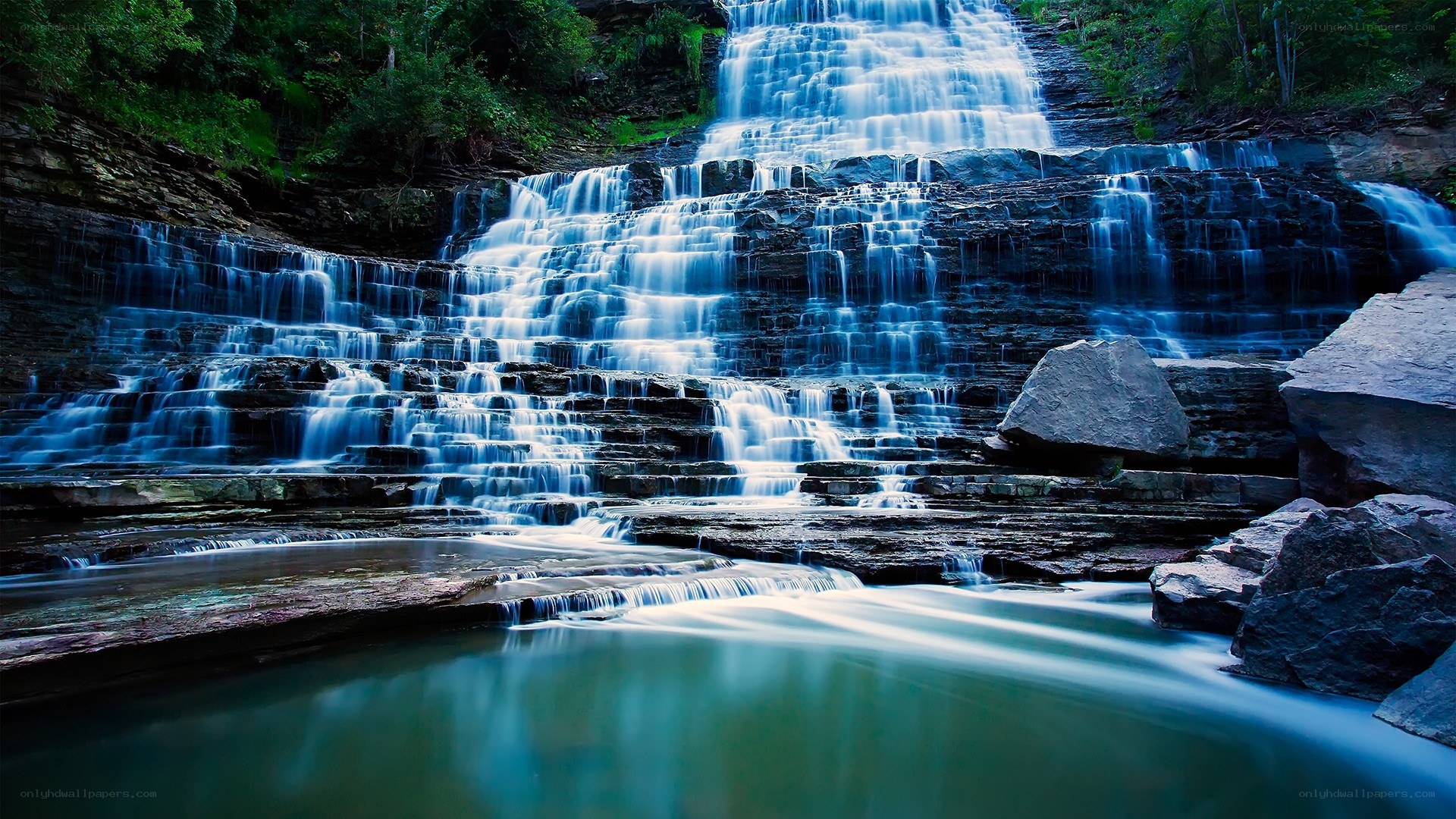 Tiered waterfall in forest