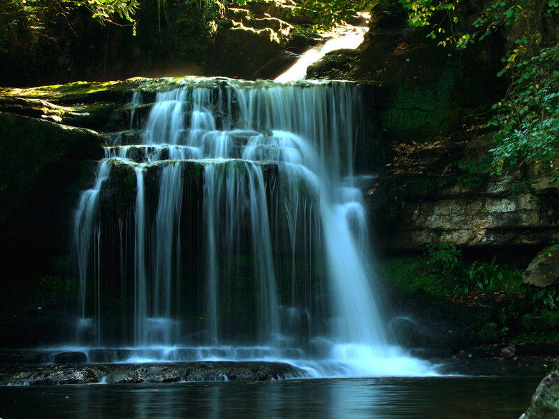 Tiered Waterfall in Forest — Green, Serene, Afternoon, Photograph, Rocks