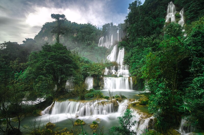 Tiered Waterfall in Forest — Green, Serene, Afternoon, Photograph, Trees, River, Mountain