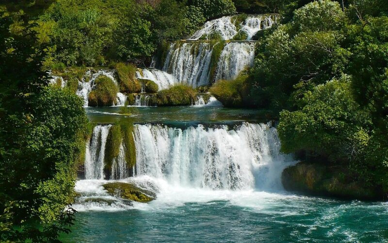 Tiered Waterfall in Forest — Green, Serene, Afternoon, Photograph, Trees, Rocks, River, Blue, White