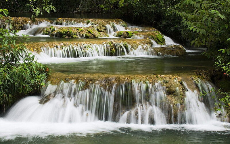 Tiered Waterfall in Forest — River