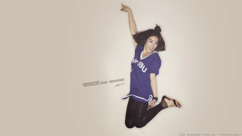 Tiffany jumping in purple shirt