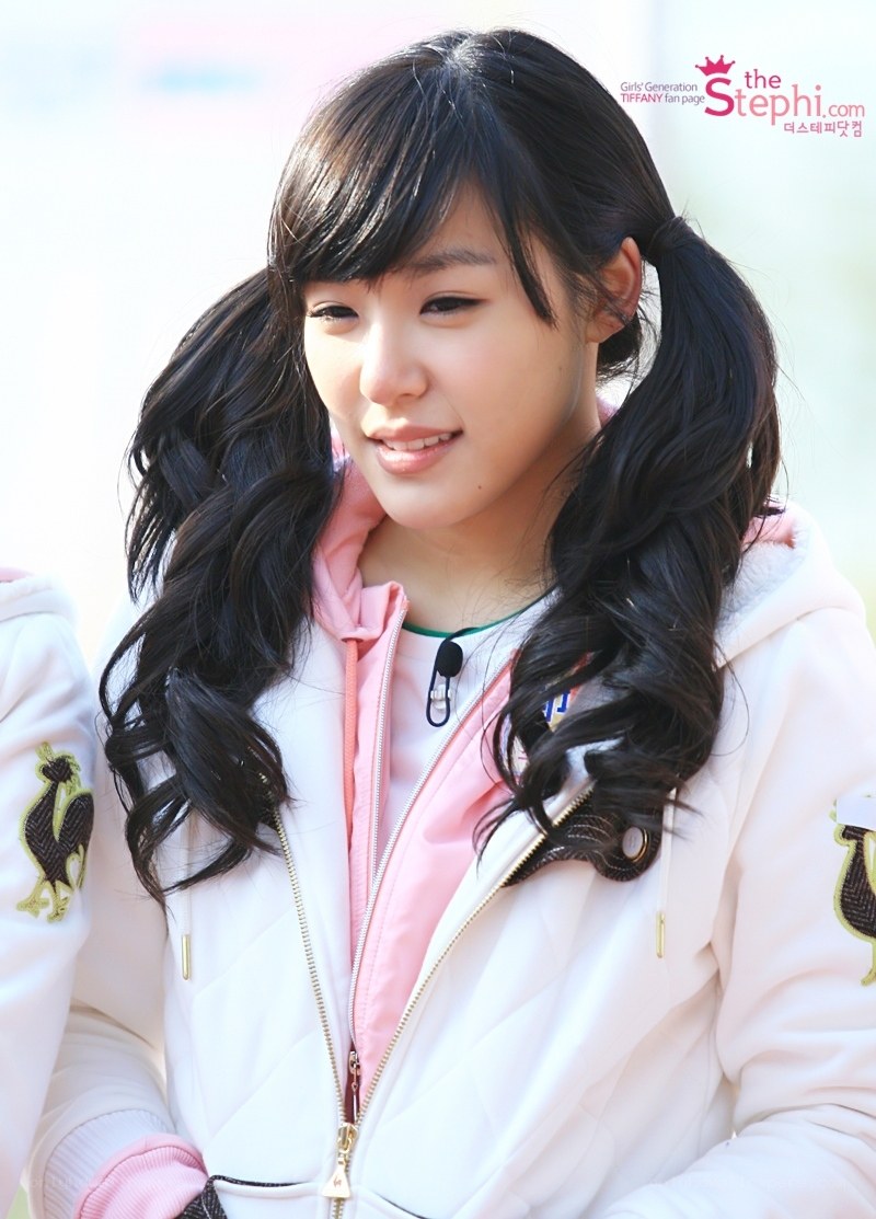 Tiffany smiling in white jacket