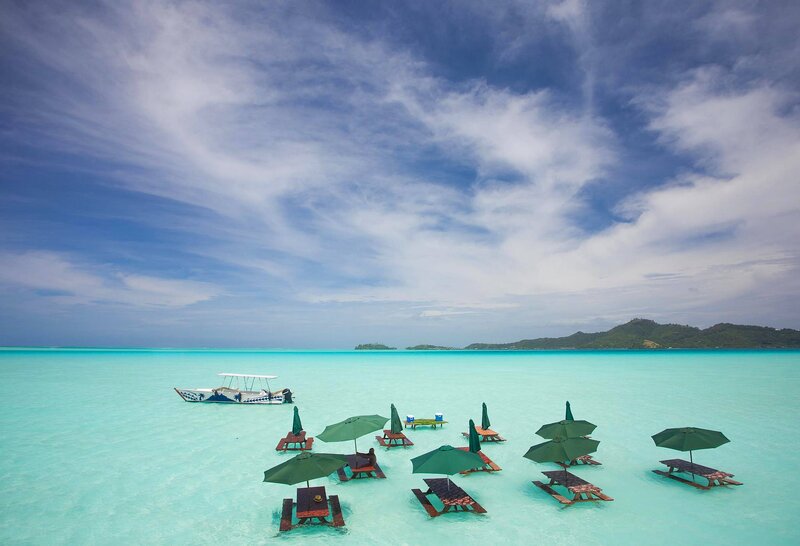 Tiki Boat in Turquoise Water