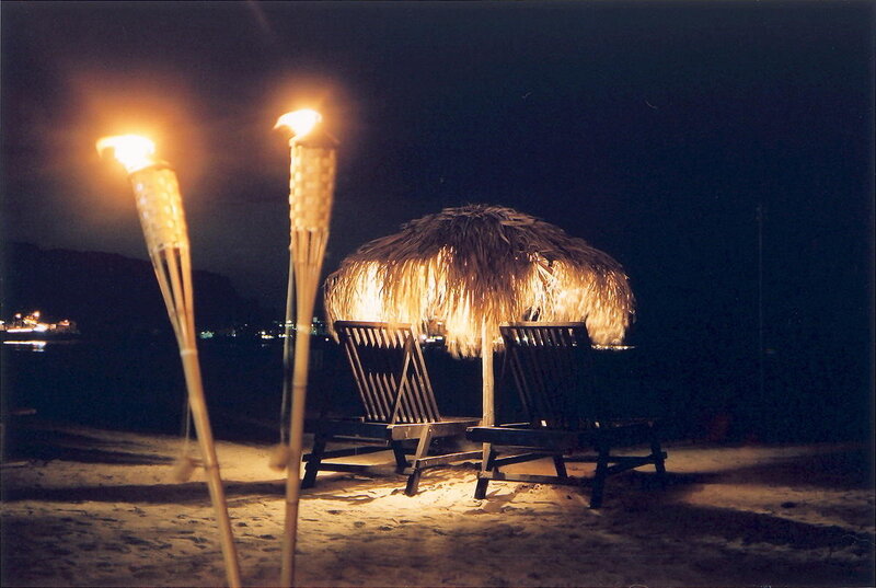 Tiki Torches on Beach — Black