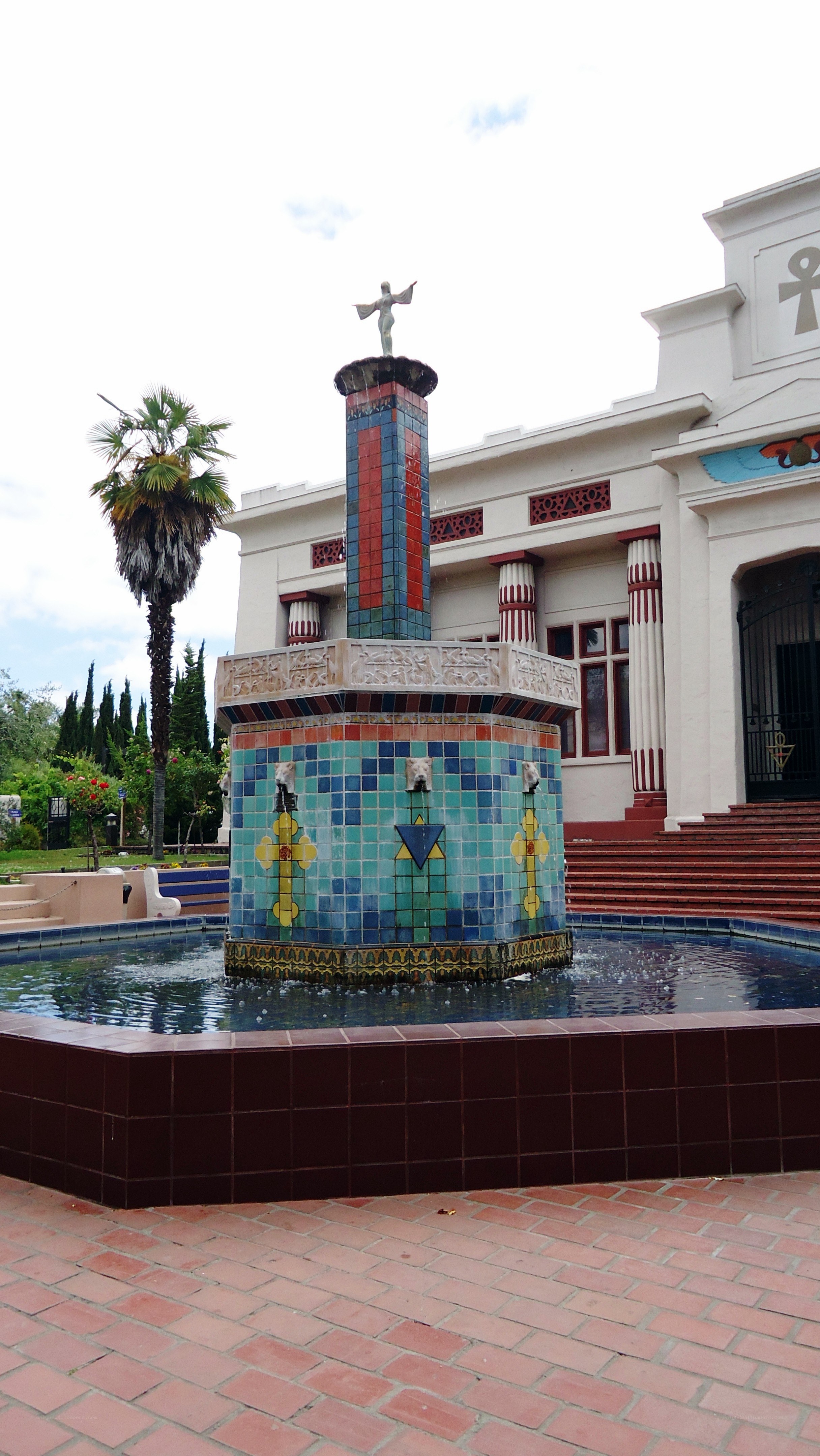tiled fountain with statue
