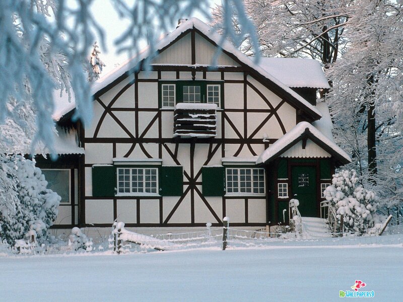 Timber-frame House in Snow