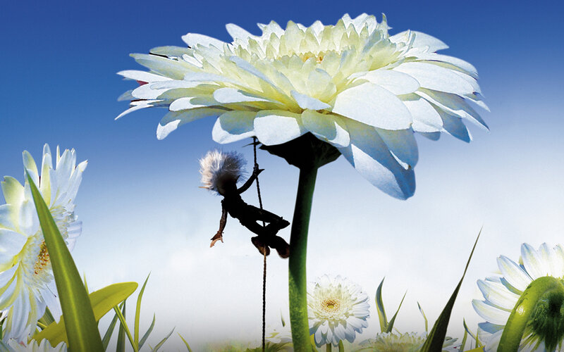 tiny figure climbing flower