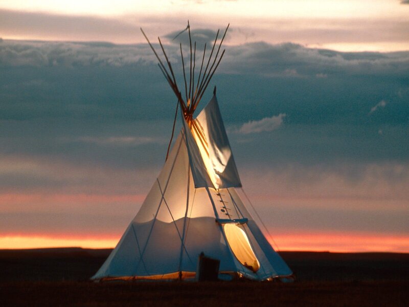 Tipi at sunset on plains
