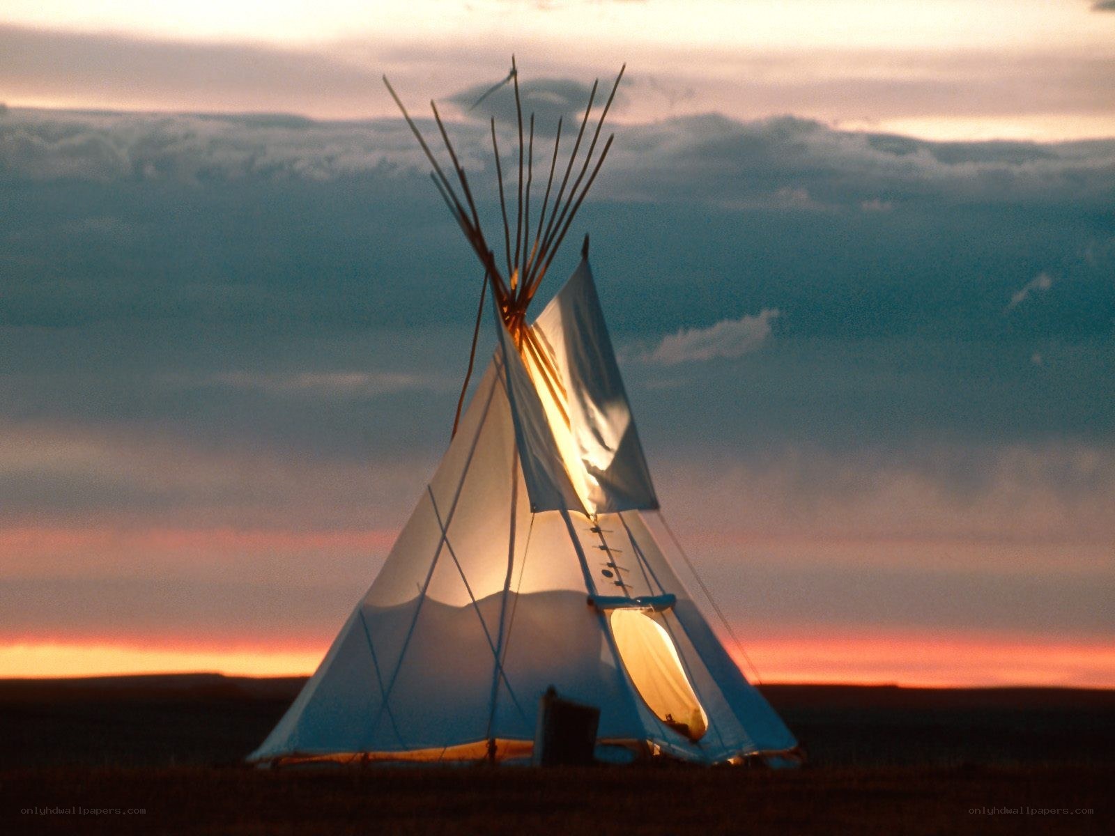 Tipi at sunset on plains