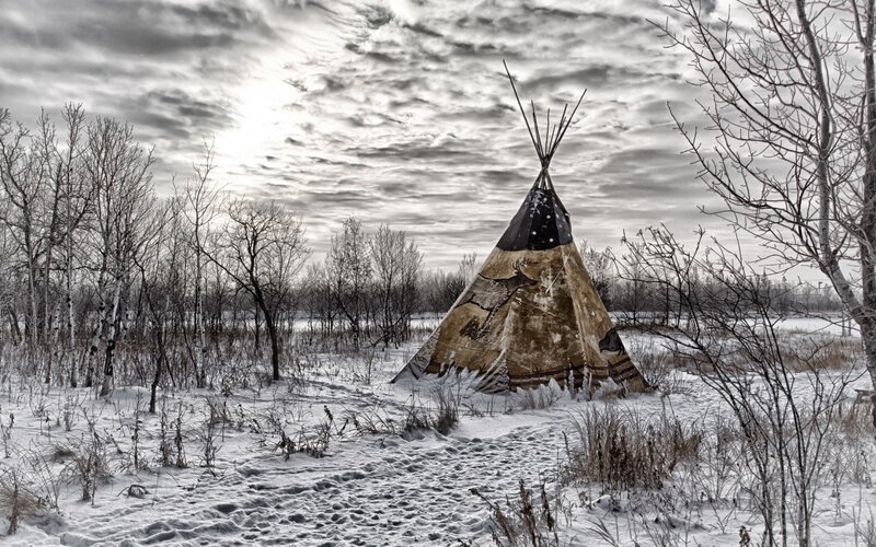 Tipi in Snowy Field