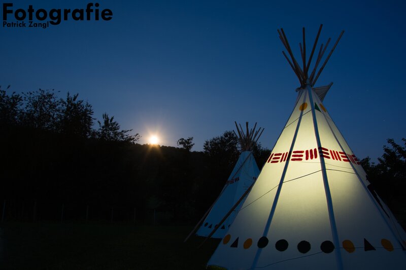 Tipi Tents at Night