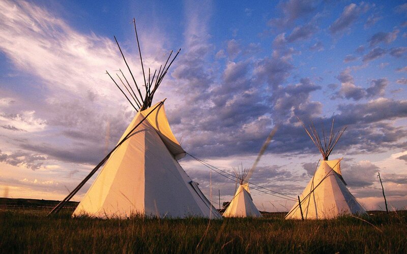 Tipis in Grassland