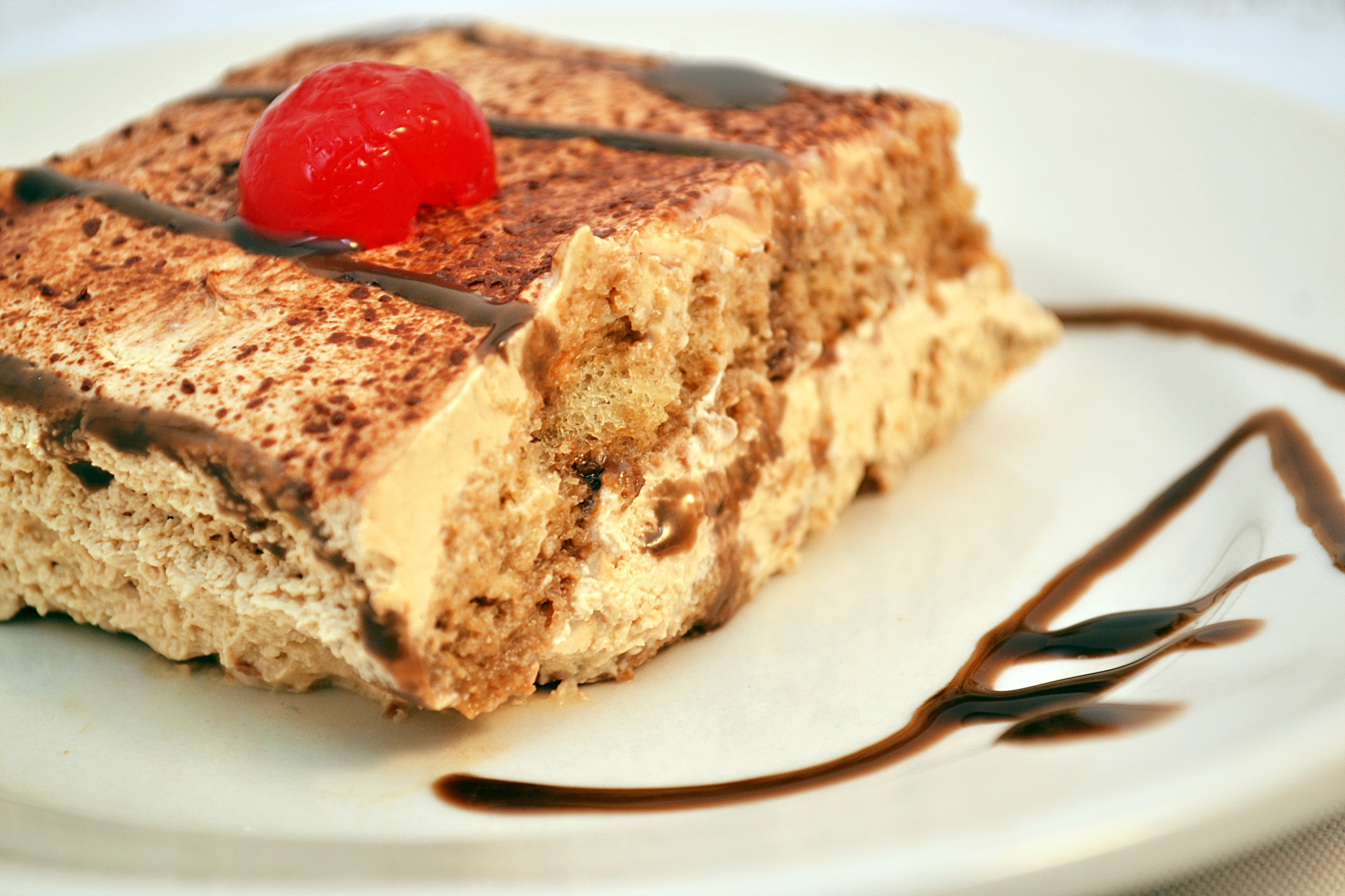 Tiramisu dessert with cherry
