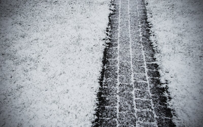 Tire tracks in snowy field