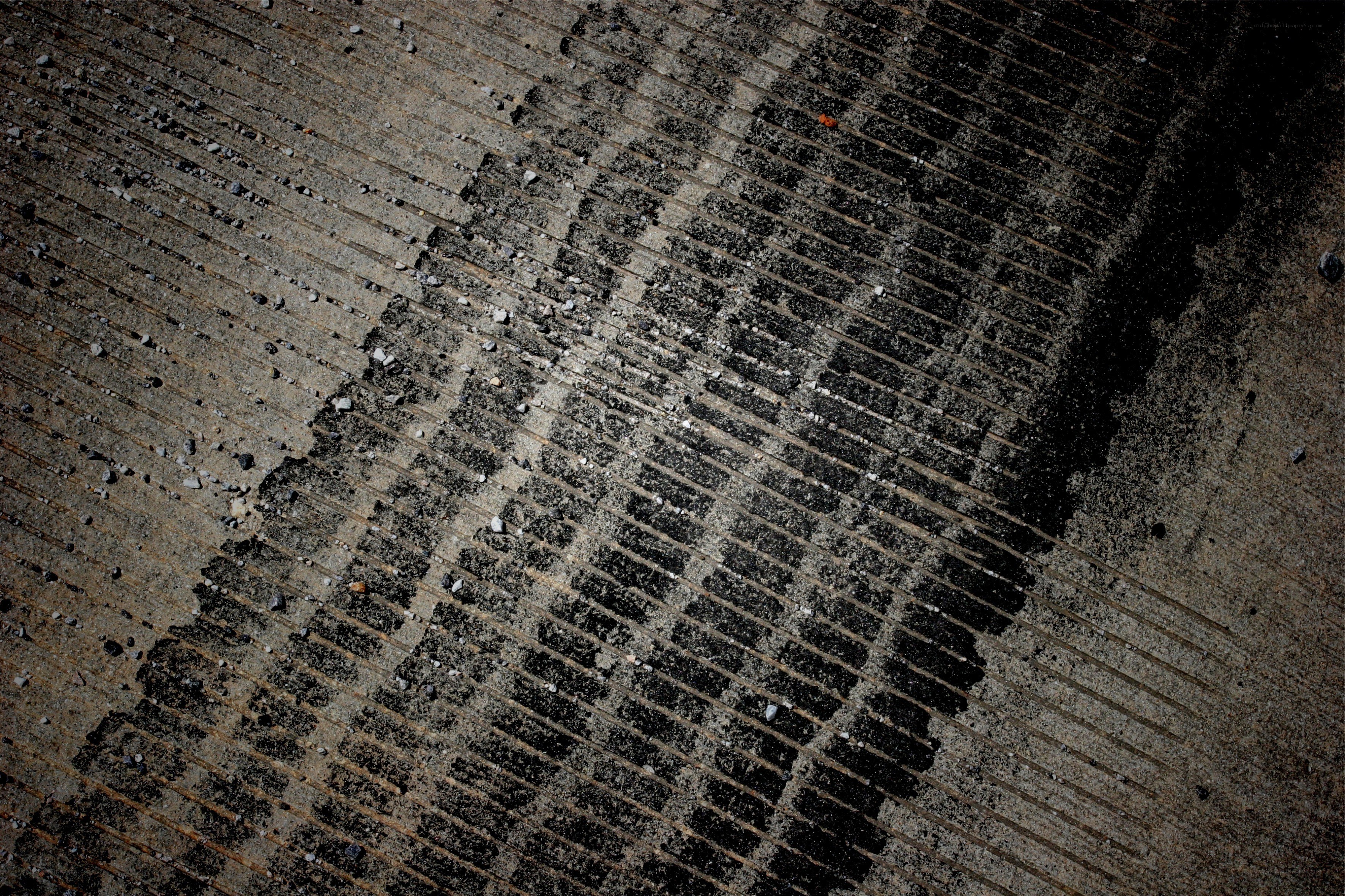 tire tracks on concrete