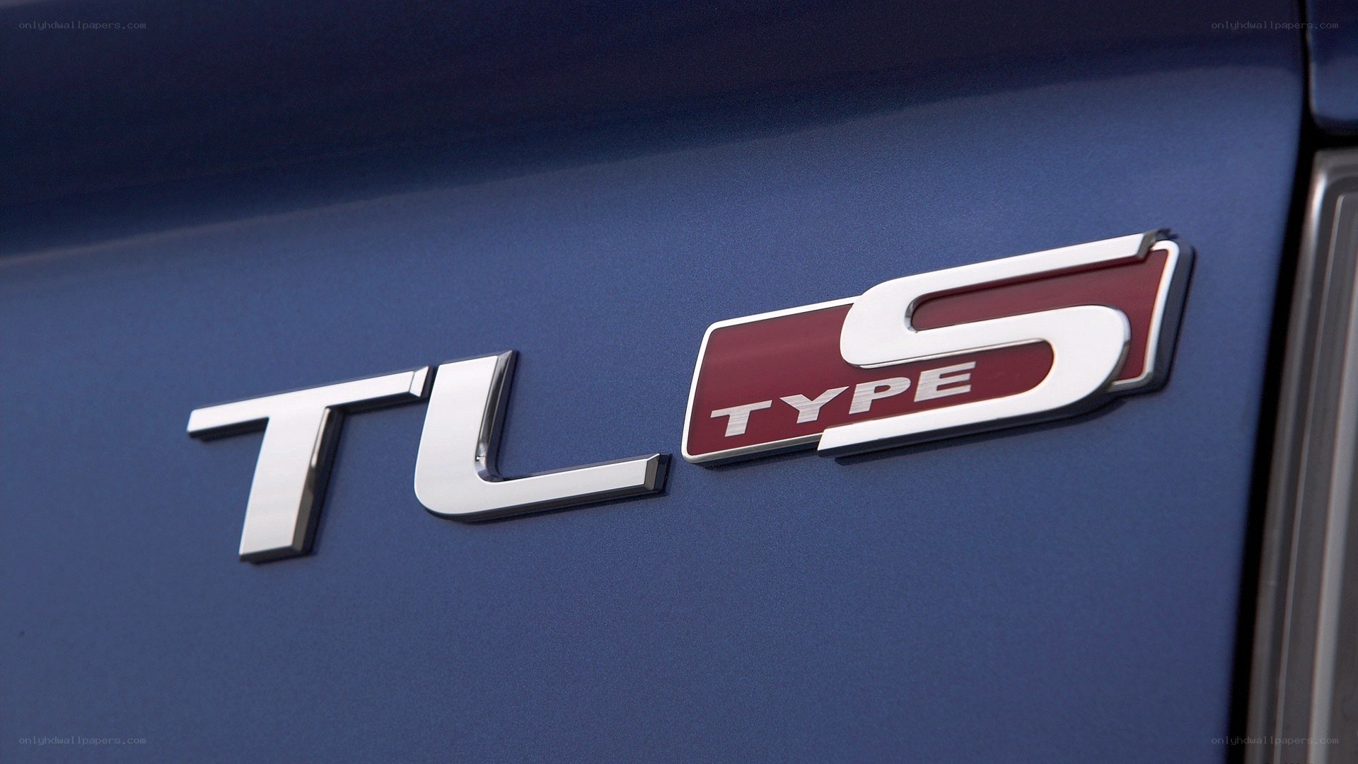 TL S Type badge on car