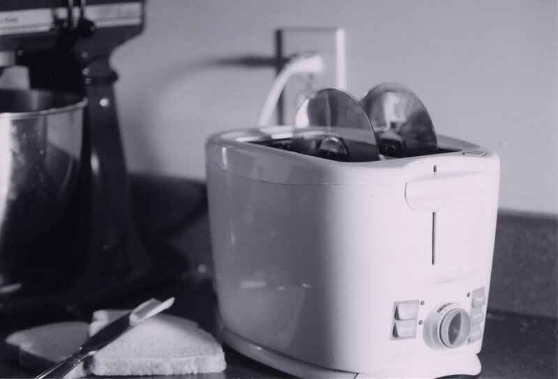 Toaster with bread on counter