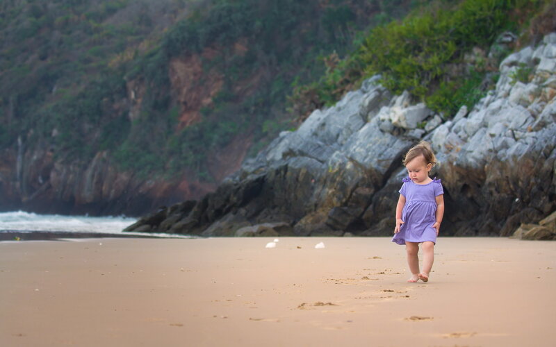 Toddler Girl on Beach — Brown